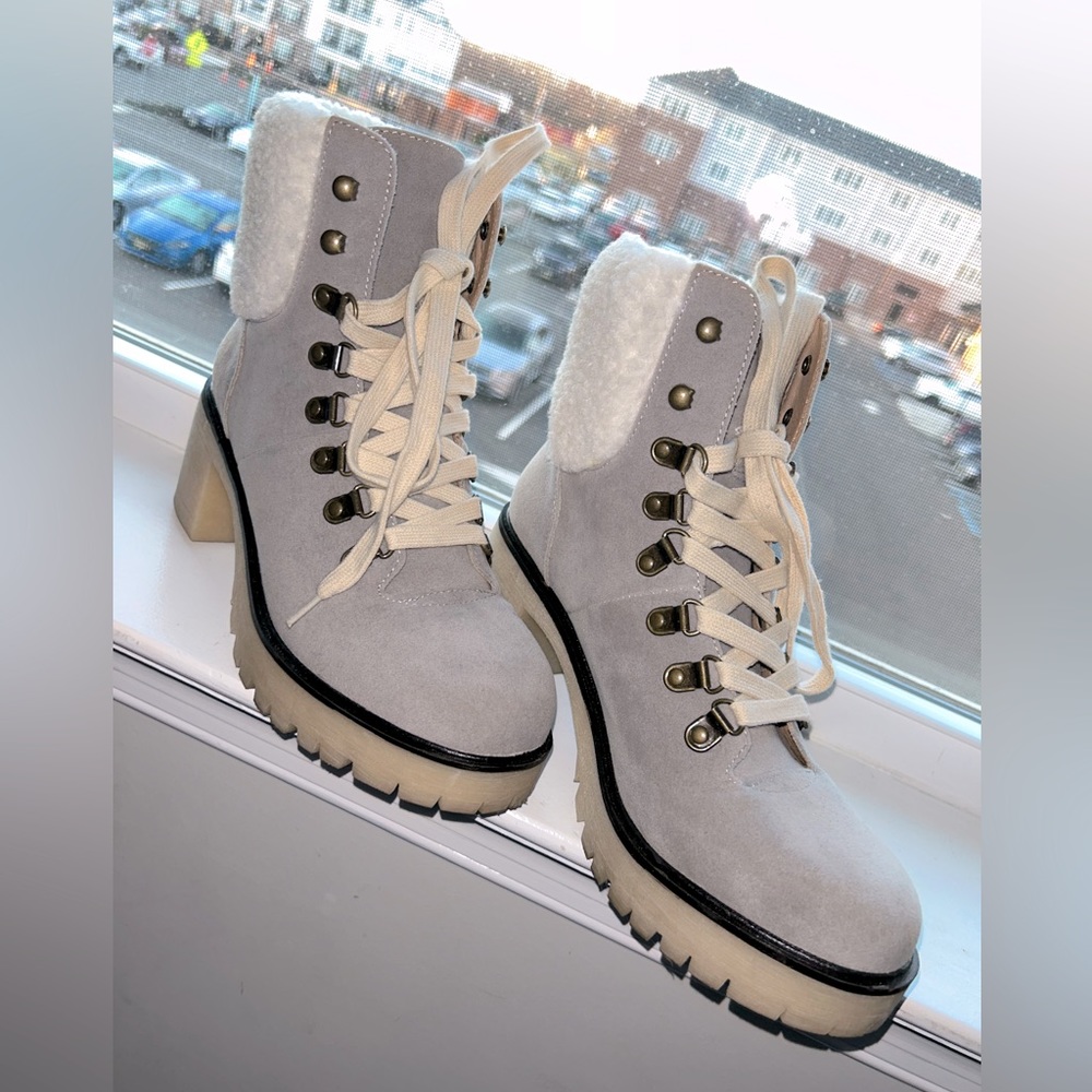 Heeled lace up boot